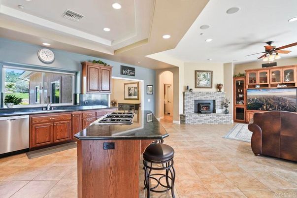 Fireplace, Interior, Kitchen, Recessed Lighting, Stainless Steel Appliances