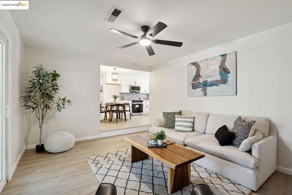 Dining room, Interior, Kitchen, Living room, Pendant Lights, Stainless Steel Appliances, Wood Texture Flooring