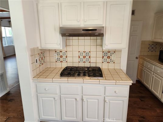 Interior, Kitchen, Tile Countertops, Wood Texture Flooring