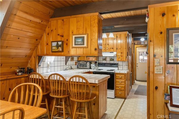 Interior, Kitchen, Pendant Lights, Tile Countertops, Wooden Ceilings, Wooden Walls