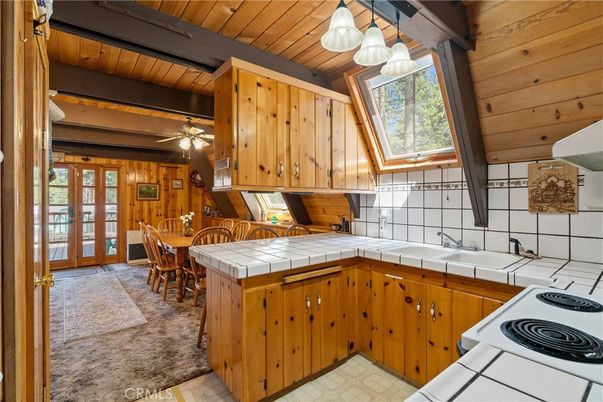 Dining room, Interior, Kitchen, Tile Countertops, Wooden Beams, Wooden Ceilings, Wooden Walls