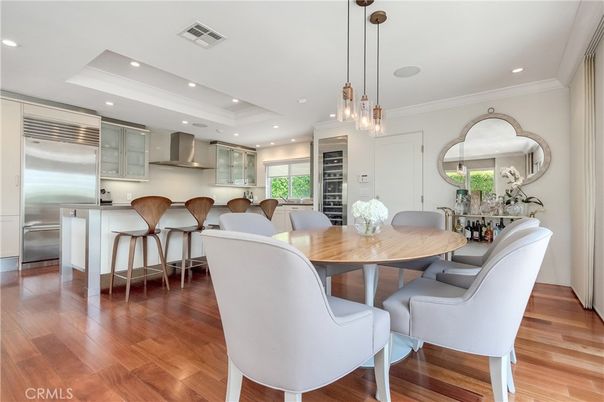 Dining room, Interior, Kitchen, Pendant Lights, Recessed Lighting, Stainless Steel Appliances, Wood Texture Flooring