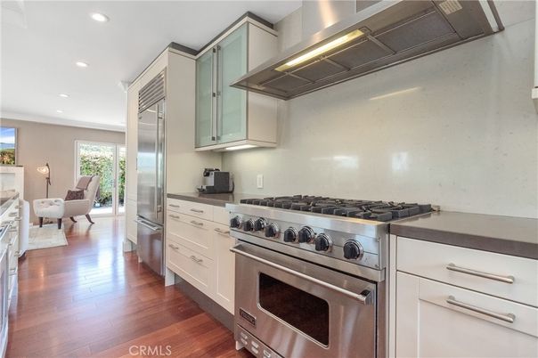 Dining room, Interior, Kitchen, Recessed Lighting, Stainless Steel Appliances, Wood Texture Flooring