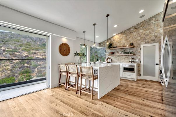 Interior, Kitchen, Pendant Lights, Recessed Lighting, Stainless Steel Appliances, Stone Walls, Wood Texture Flooring