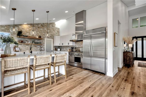 Interior, Kitchen, Pendant Lights, Recessed Lighting, Stainless Steel Appliances, Stone Walls, Wood Texture Flooring