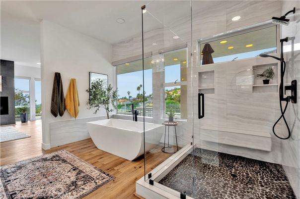 Bathroom, Free Standing Baths, Glass Shower, Interior, Recessed Lighting, Wood Texture Flooring