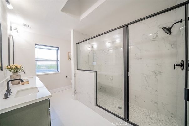 Bathroom, Dual Sink Vanities, Glass Shower, Interior, Marble Walls