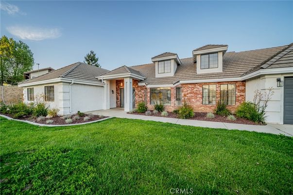 Attached, Backyard, Exterior, Facade, Brick Facade, Ranch