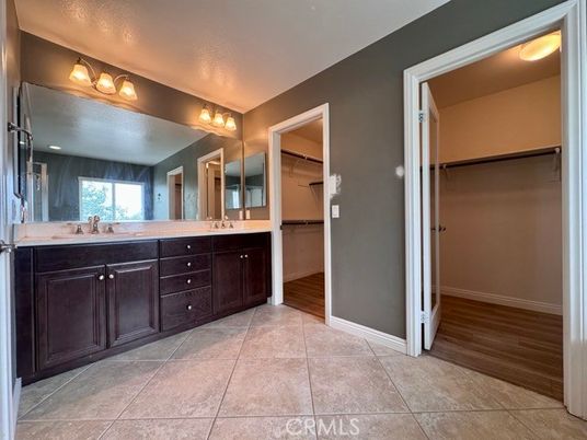 Bathroom, Dual Sink Vanities, Glass Shower, Interior, Walk-in Closets, Wood Texture Flooring
