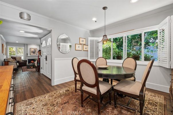 Dining room, Fireplace, Interior, Living room, Pendant Lights, Recessed Lighting, Wood Texture Flooring
