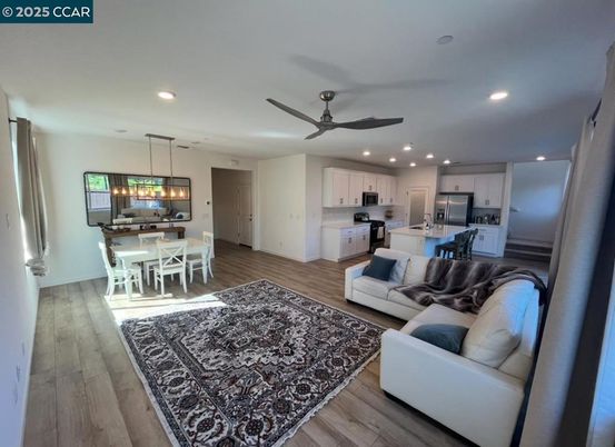 Dining room, Interior, Kitchen, Living room, Pendant Lights, Recessed Lighting, Stainless Steel Appliances, Wood Texture Flooring
