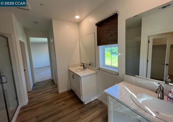 Bathroom, Dual Sink Vanities, Interior, Recessed Lighting, Wood Texture Flooring