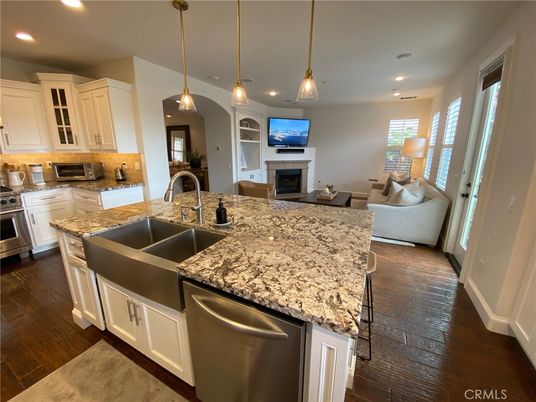 Fireplace, Interior, Kitchen, Pendant Lights, Recessed Lighting, Stainless Steel Appliances, Wood Texture Flooring
