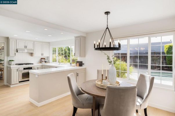 Dining room, Interior, Kitchen, Pendant Lights, Recessed Lighting, Stainless Steel Appliances, Wood Texture Flooring