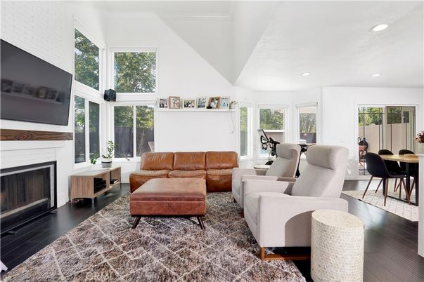Dining room, Fireplace, Fitness Equipment, Interior, Living room, Recessed Lighting, Wood Texture Flooring