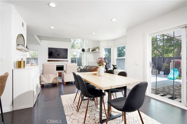 Dining room, Fireplace, Interior, Living room, Recessed Lighting, Wood Texture Flooring