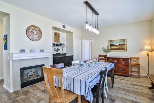 Dining room, Fireplace, Interior, Pendant Lights, Wood Texture Flooring