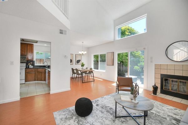 Chandelier, Dining room, Fireplace, Interior, Kitchen, Living room, Recessed Lighting, Wood Texture Flooring