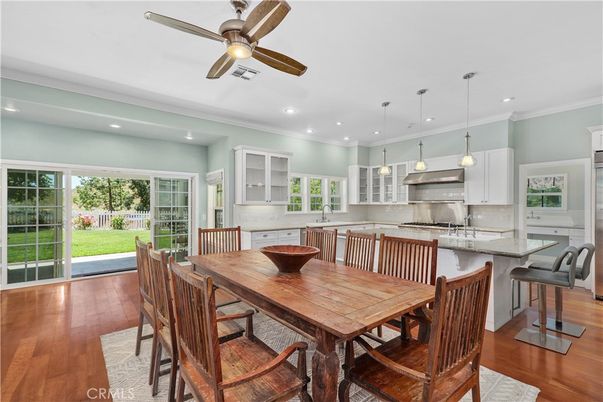 Dining room, Interior, Kitchen, Pendant Lights, Recessed Lighting, Stainless Steel Appliances, Wood Texture Flooring