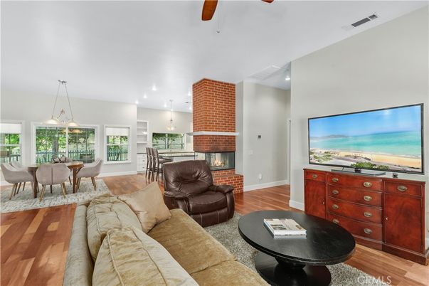 Dining room, Fireplace, Interior, Living room, Pendant Lights, Recessed Lighting, Stone Walls, Wood Texture Flooring