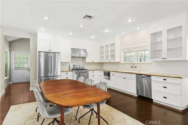 Dining room, Interior, Kitchen, Recessed Lighting, Stainless Steel Appliances, Wood Texture Flooring