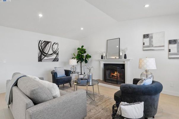 Fireplace, Interior, Living room, Recessed Lighting, Wood Texture Flooring