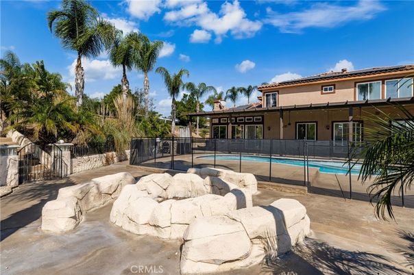 Exterior, Pool, Solar Panels