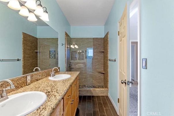 Bathroom, Dual Sink Vanities, Glass Shower, Interior, Wood Texture Flooring