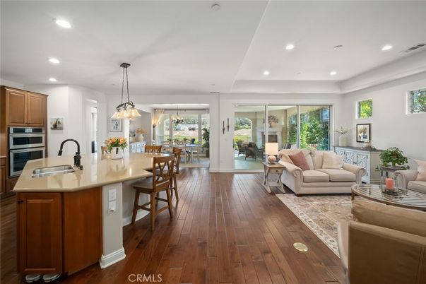 Dining room, Interior, Kitchen, Living room, Pendant Lights, Recessed Lighting, Stainless Steel Appliances, Wood Texture Flooring