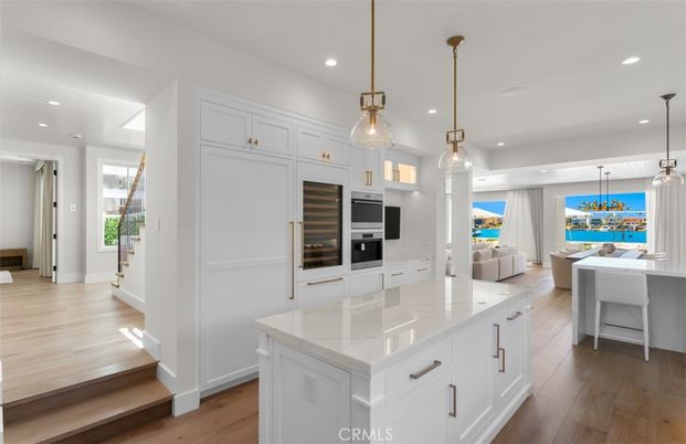 Interior, Kitchen, Pendant Lights, Recessed Lighting, Stainless Steel Appliances, Water, Wood Texture Flooring