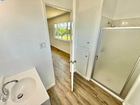 Bathroom, Glass Shower, Interior, Wood Texture Flooring