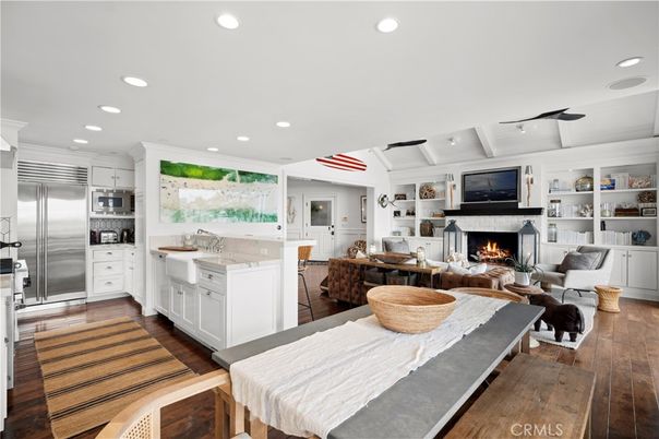 Fireplace, Interior, Kitchen, Living room, Recessed Lighting, Stainless Steel Appliances, Wood Texture Flooring