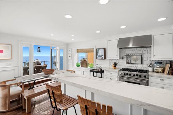 Dining room, Interior, Kitchen, Recessed Lighting, Stainless Steel Appliances, Water, Wood Texture Flooring