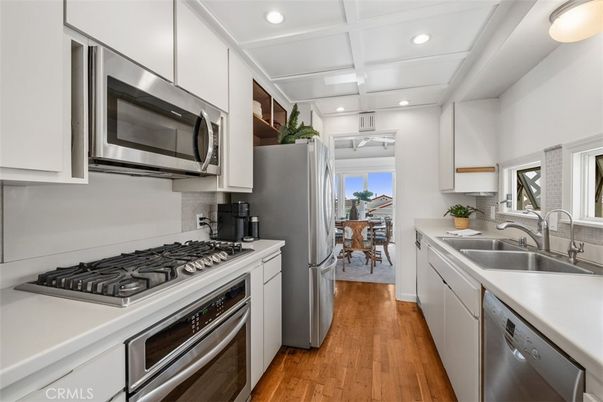 Dining room, Interior, Kitchen, Recessed Lighting, Stainless Steel Appliances, Water, Wood Texture Flooring
