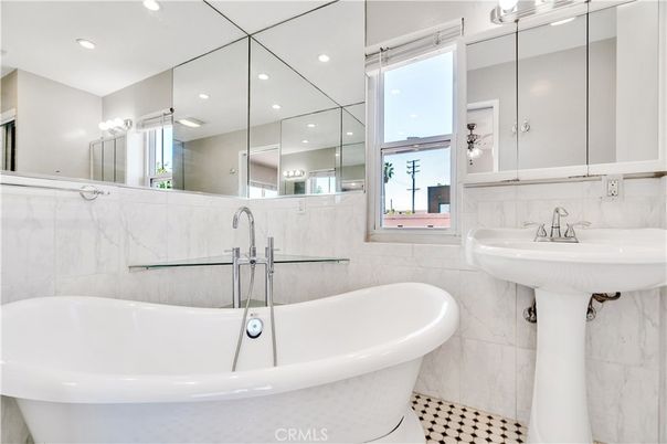 Bathroom, Dual Sink Vanities, Free Standing Baths, Interior, Marble Walls, Recessed Lighting