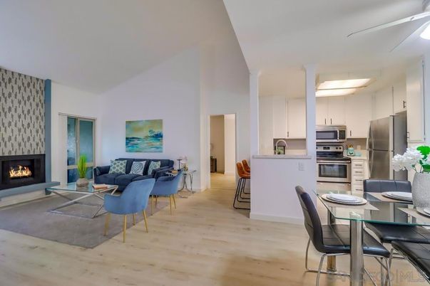 Dining room, Fireplace, Interior, Kitchen, Living room, Stainless Steel Appliances, Wood Texture Flooring