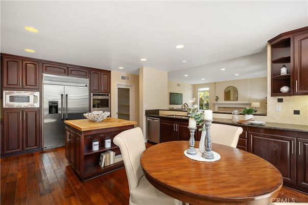 Dining room, Interior, Kitchen, Recessed Lighting, Stainless Steel Appliances, Wood Texture Flooring