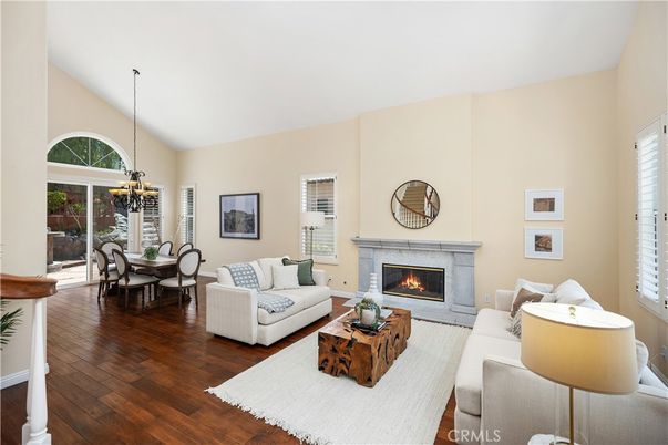 Chandelier, Dining room, Fireplace, Interior, Living room, Pendant Lights, Wood Texture Flooring