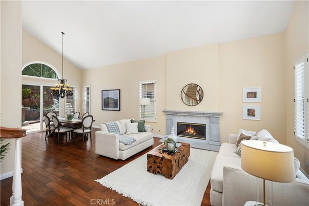 Chandelier, Dining room, Fireplace, Interior, Living room, Pendant Lights, Wood Texture Flooring