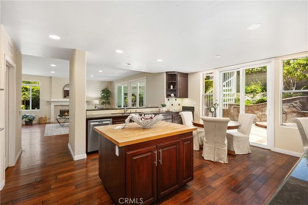 Dining room, Fireplace, Interior, Kitchen, Recessed Lighting, Wood Texture Flooring