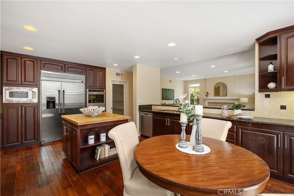 Dining room, Interior, Kitchen, Recessed Lighting, Stainless Steel Appliances, Wood Texture Flooring