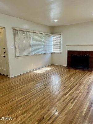 Empty room, Fireplace, Interior, Recessed Lighting, Wood Texture Flooring