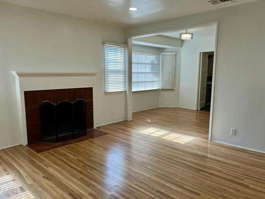 Empty room, Fireplace, Interior, Recessed Lighting, Wood Texture Flooring