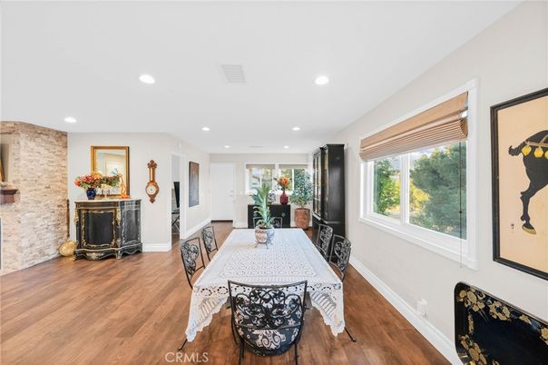 Dining room, Fireplace, Interior, Recessed Lighting, Stone Walls, Wood Texture Flooring