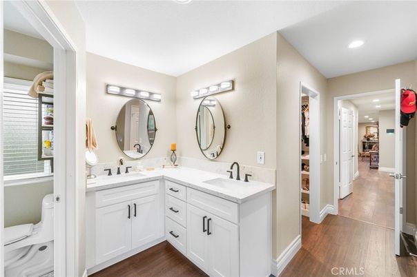 Bathroom, Dual Sink Vanities, Interior, Recessed Lighting, Wood Texture Flooring