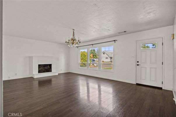 Chandelier, Empty room, Fireplace, Interior, Wood Texture Flooring