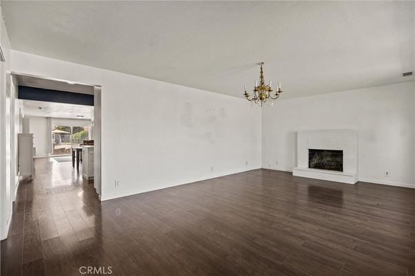 Chandelier, Empty room, Fireplace, Interior, Wood Texture Flooring