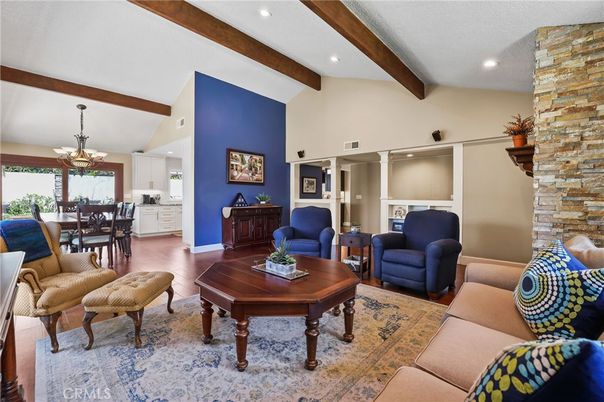 Chandelier, Dining room, Interior, Living room, Recessed Lighting, Stone Walls, Wooden Beams, Wood Texture Flooring