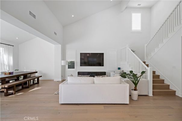 Dining room, Fireplace, Interior, Living room, Recessed Lighting, Wood Texture Flooring