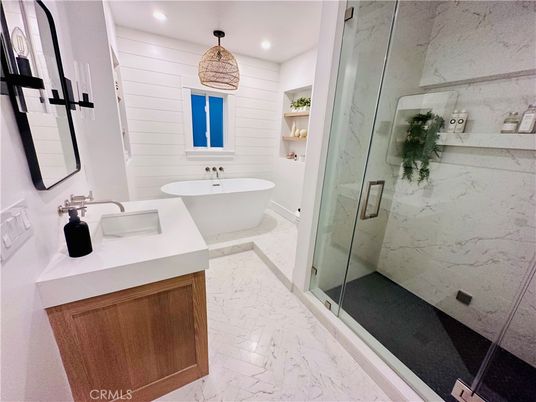 Bathroom, Free Standing Baths, Glass Shower, Interior, Marble, Marble Walls, Recessed Lighting